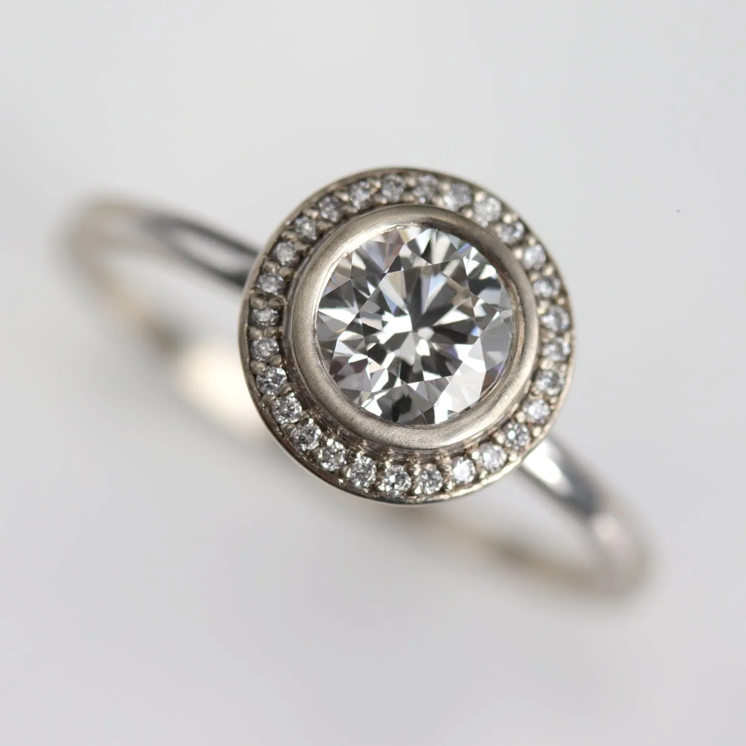 Bezel-set Halo Solitaire Engagement Ring