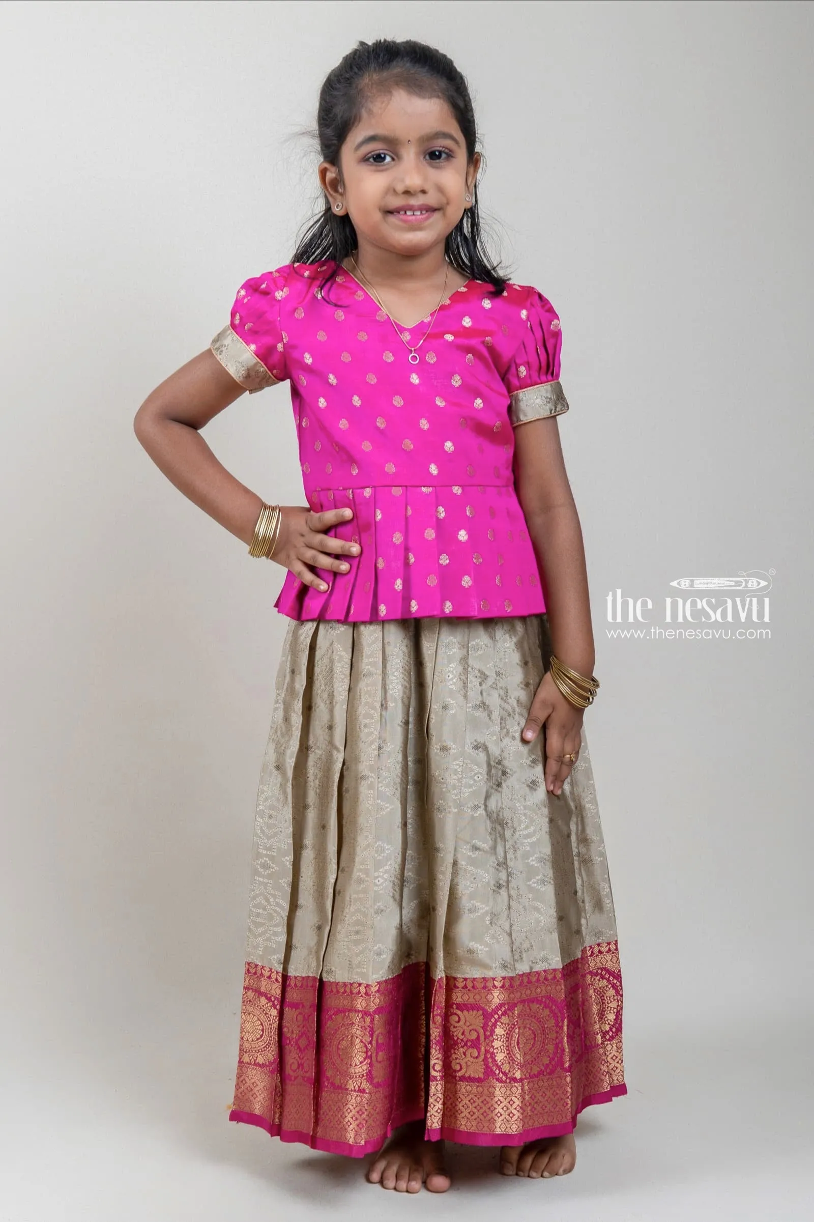 Butta Printed Pink Silk Peplum Blouse with Knife Pleated Embroidered Beige Silk Skirt for Girls